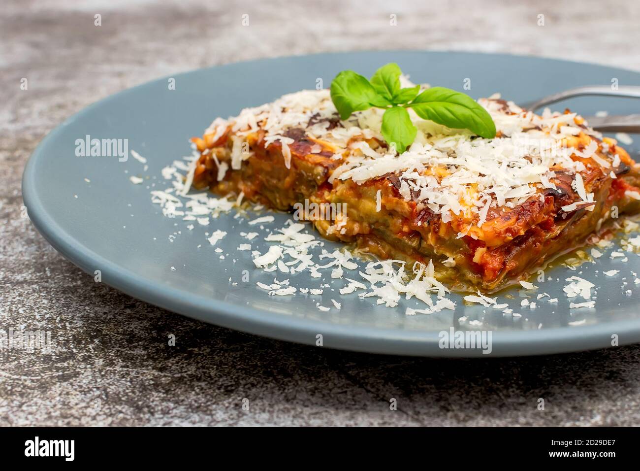 Parmigiana di Melanzane strips of fried eggplant with parmesan, baked