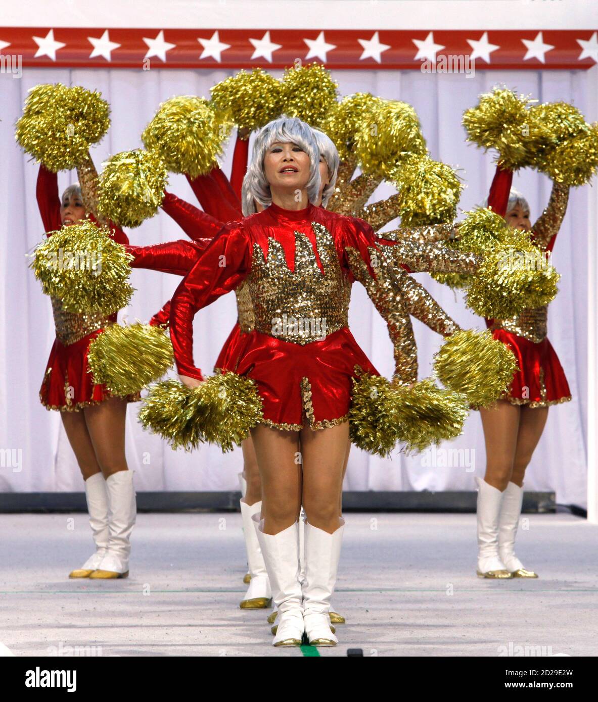 Members of a seniors' group called "Japan Pom Pom" perform on stage the All Japan Cheerleading and Dance Championship Chiba, east of Tokyo, March 27, Japan may have