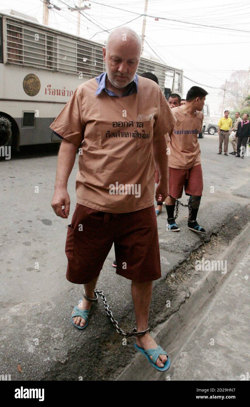 Swiss man Oliver Rudolf Jufer, 57, arrives at a Chiang Mai court, 700 km (310 miles) north of Bangkok March 12, 2007. A lese majeste trial against Jufer, arrested for defacing portraits of Thailand's King Bhumibol Adulyadej on the revered monarch's birthday in December last year, began in a confidential hearing on Monday as the court did not want details of the offence against the monarch to be heard. If found guilty, he faces 75 years in jail. REUTERS/Sukree Sukplang (THAILAND) Stock Photo