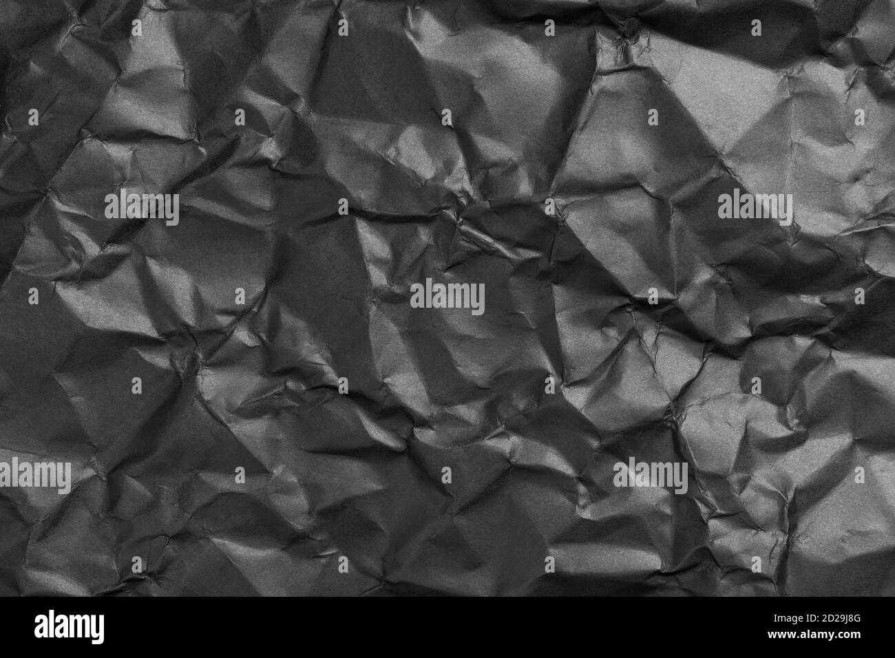 black crumpled wrinkled paper texture Stock Photo