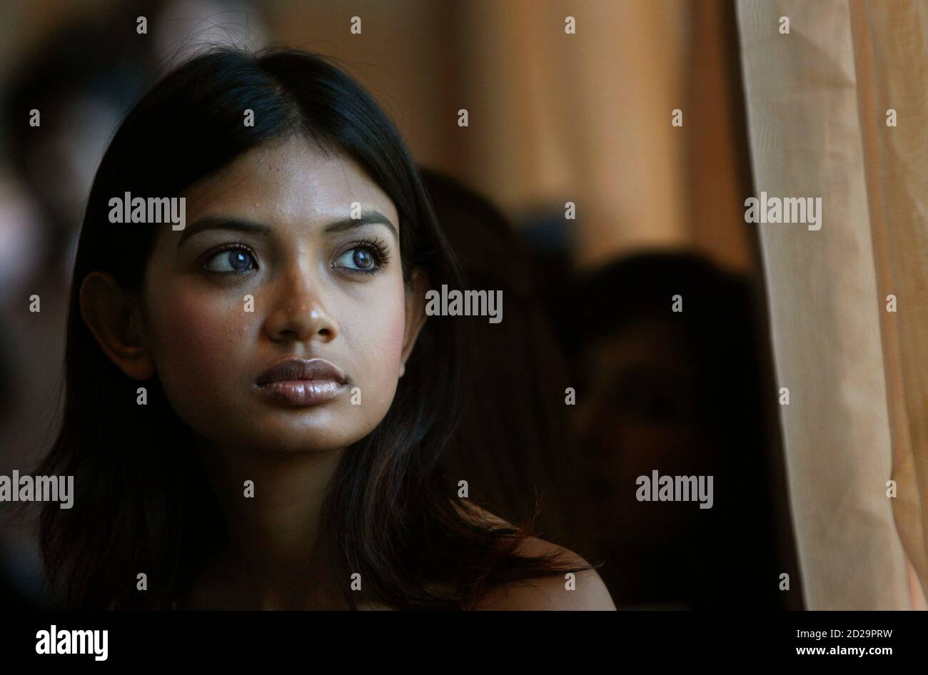 An aspiring model waits for her turn to be judged during an audition for  fashion models in New Delhi September 3, 2008. REUTERS/Adnan Abidi (INDIA  Stock Photo - Alamy