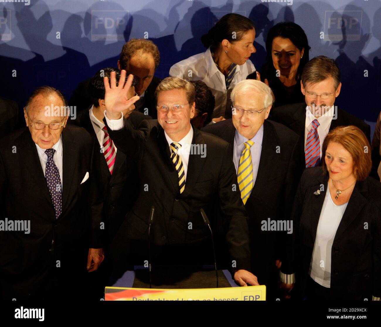 Former Foreign Minister Hans-Dietrich Genscher, Guido Westerwelle, leader of the pro-business Free Democratic Party (FDP), FDP deputy parliamentary leader Rainer Bruederle, Hermann Otto Solms and Sabine Leutheusser-Schnarrenberger (front row L-R) react after first exit polls in the German general election (Bundestagswahl) in Berlin September 27, 2009. REUTERS/Thomas Bohlen  (GERMANY POLITICS ELECTIONS) Stock Photo