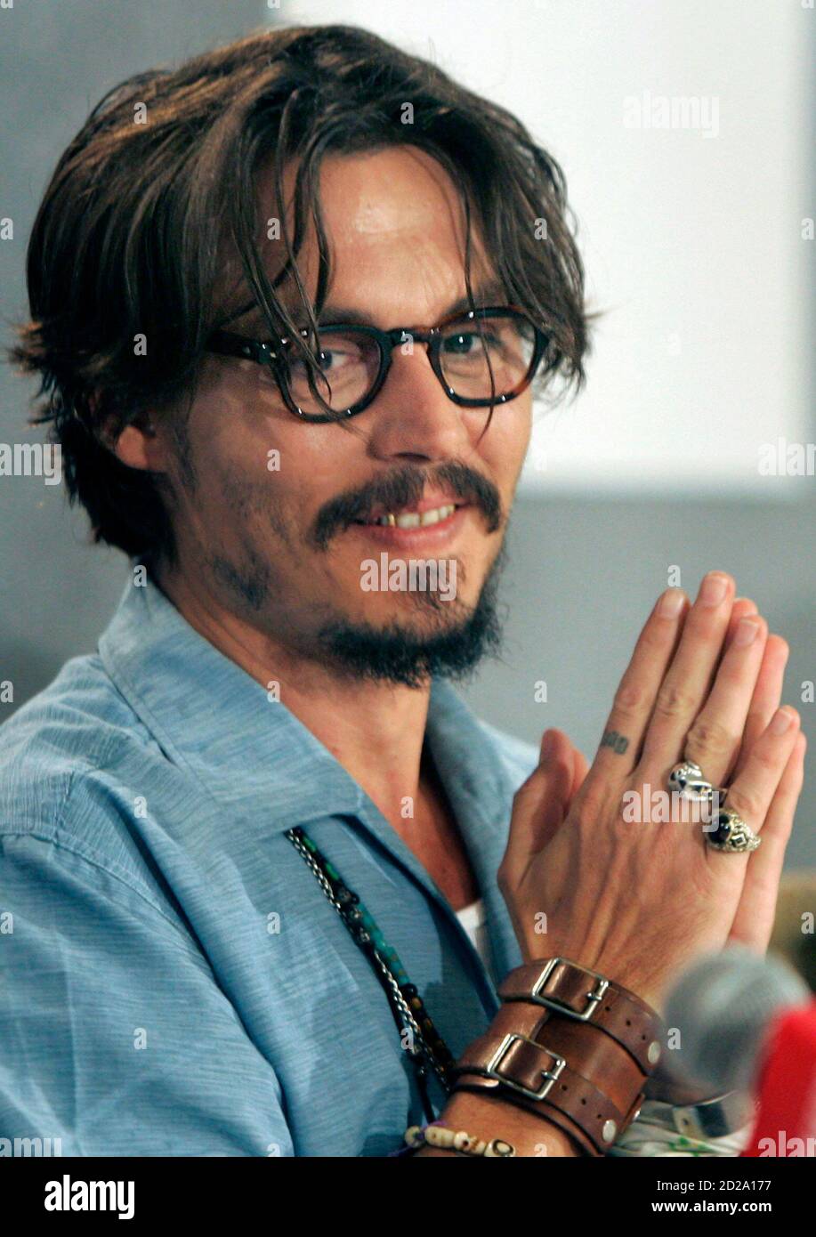 . actor Johnny Depp smiles during the news conference for 