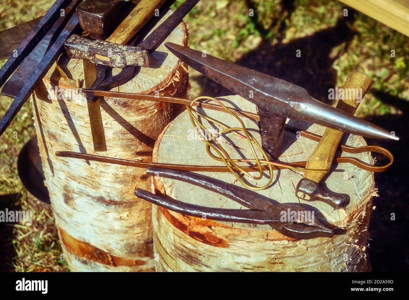 Vintage blacksmith tools. Hand-made antique tool for blacksmithing. Stock Photo
