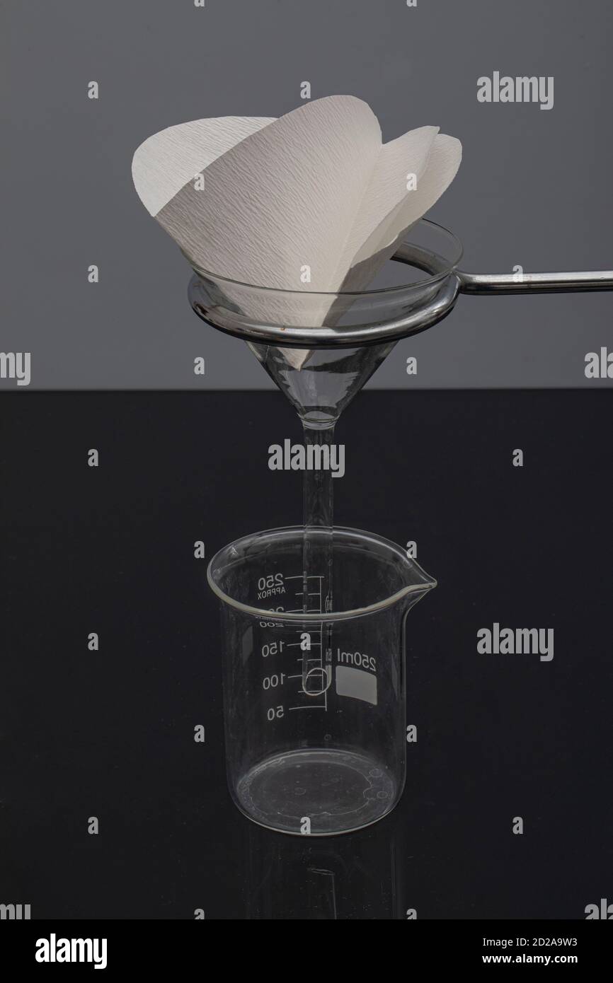 Filter paper in laboratory. Scientists are chemical filtration by