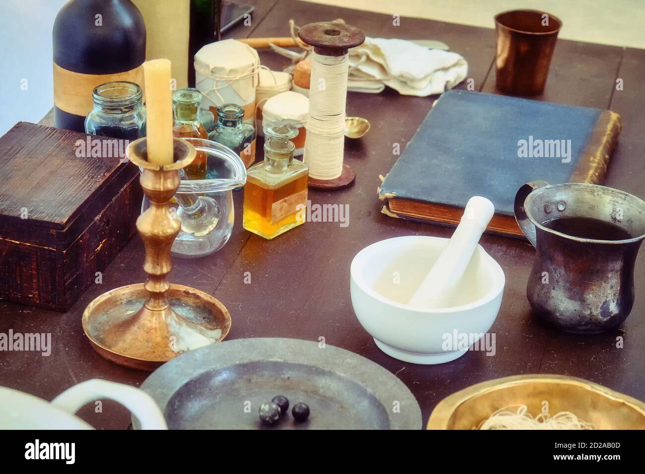 Drugs and mixtures in the field military hospital, retro style. Reconstruction of mobile medicine 18th and 19th century. Attributes of a field militar Stock Photo