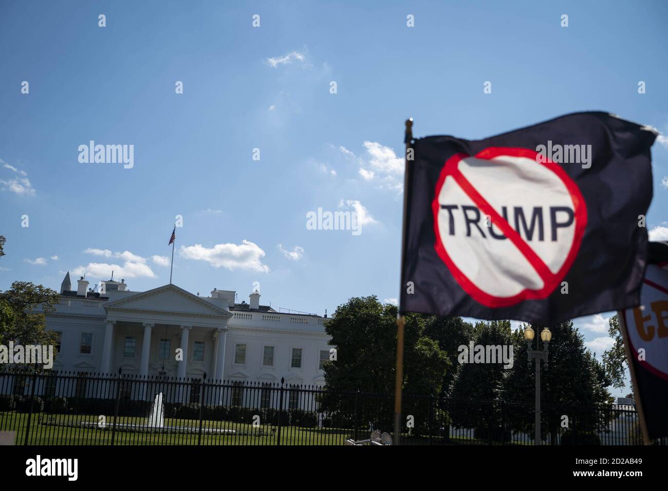Washington, United States. 06th Oct, 2020. A negative U.S. President Donald Trump flag is flown outside of the White House in Washington, DC, U.S., on Tuesday, Oct. 6, 2020. Photo by Sarah Silbiger/UPI Credit: UPI/Alamy Live News Stock Photo