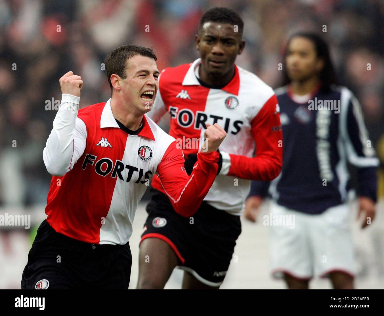 Nicky Hofs (L) and Salomon Kalou (C) of Feyenoord Rotterdam celebrate Hof's  goal against Ajax Amsterdam during their Dutch league soccer match in the  Kuip Stadium in Rotterdam, the Netherlands February 5,