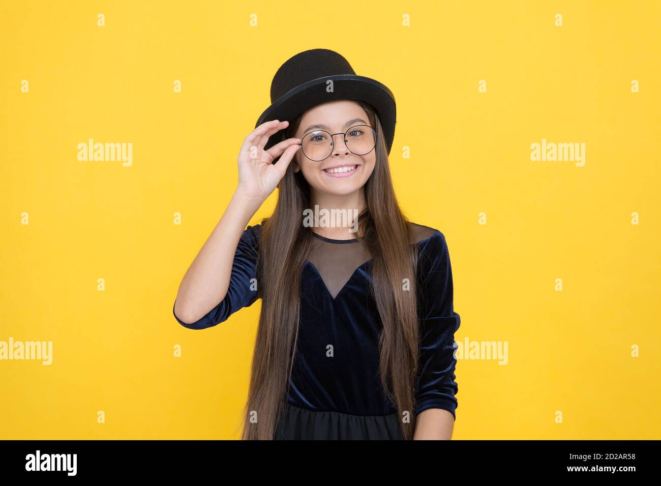 Accessorize and protect your eyesight. Happy child wear glasses yellow