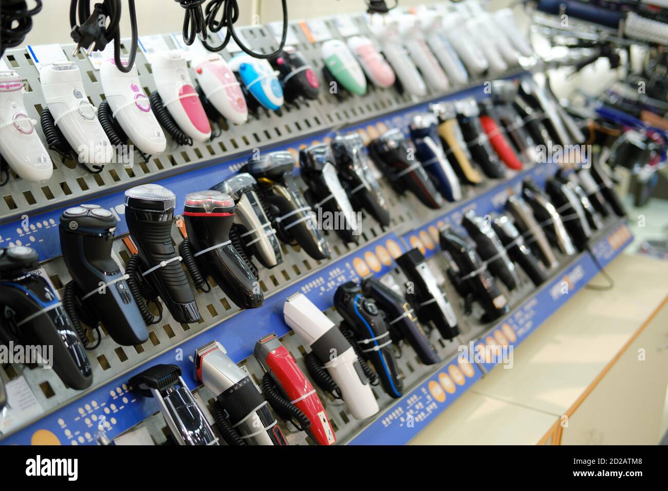 Electric shavers on a shelf in a store. Male and female electric razor Stock Photo Alamy