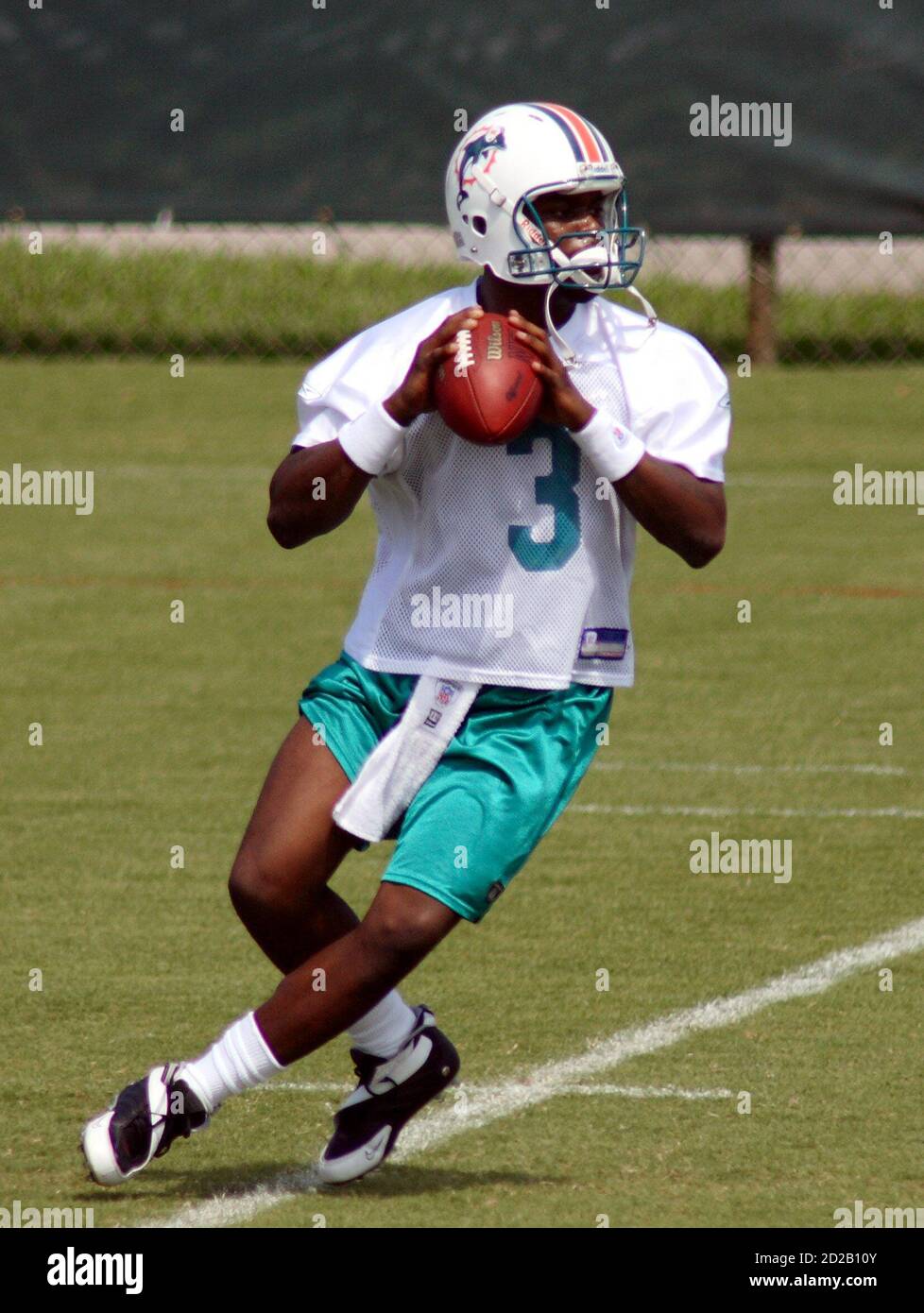 Miami Dolphins rookie un-drafted quarterback Marcus Vick drops back to pass  during mini camp in Davie, Florida May 5, 2006. Vick is the younger brother  of Atlanta Falcons star quarterback Michael Vick.