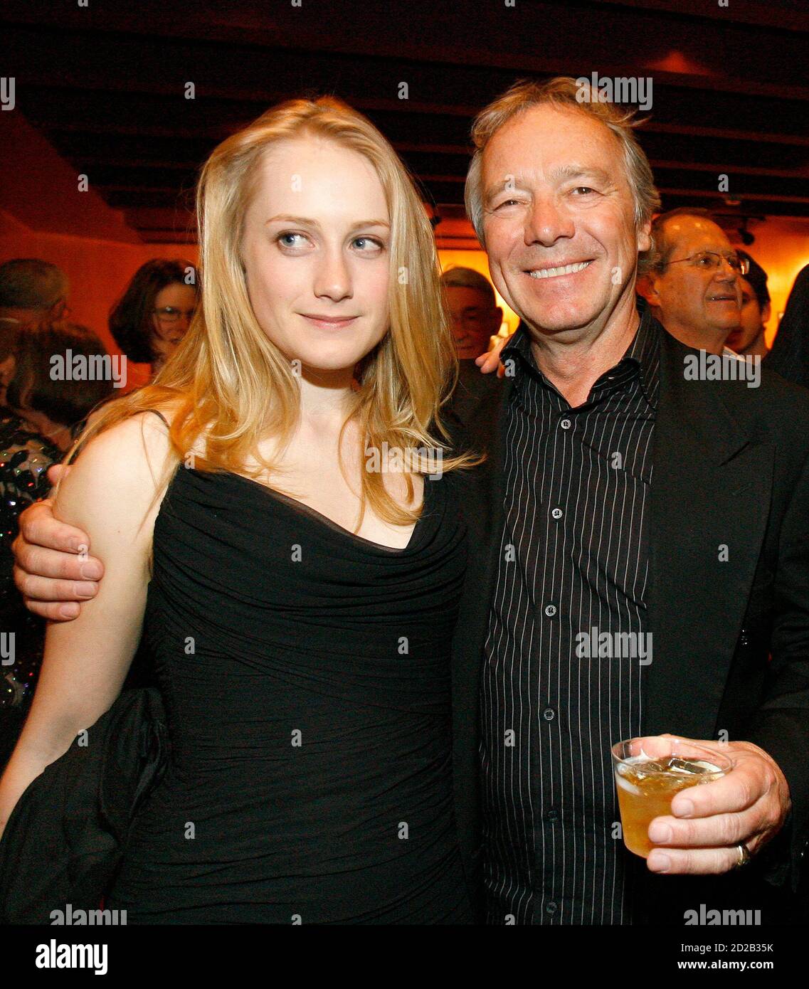 Director Christopher Cain (R) poses with cast member Tamara Hope at an