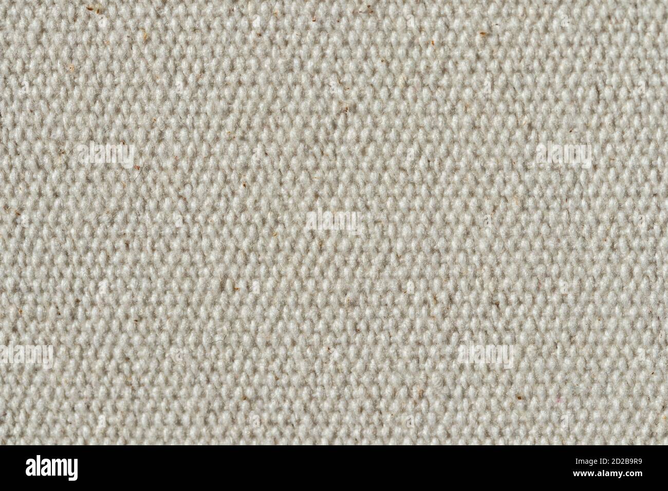 Abstract white synthetic fabric texture and background. Detail of fabric wool textile material. Stock Photo