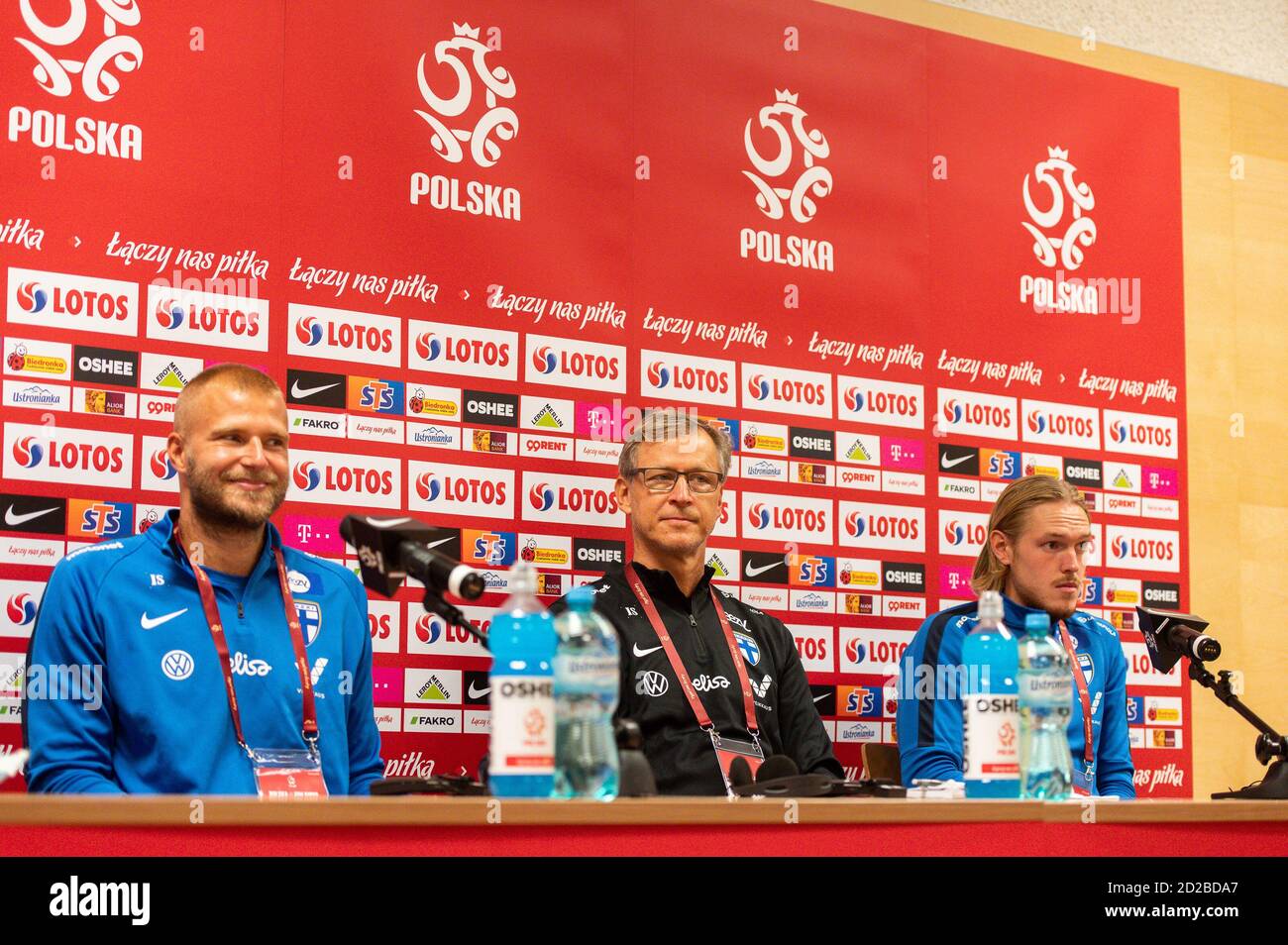 Paulus Arajuuri (L) Coach of Finland, Markku Kanerva (C) and Fredrik Jensen  (R) during a press conference one day before the international football  friendly match between Poland and Finland at the Energa