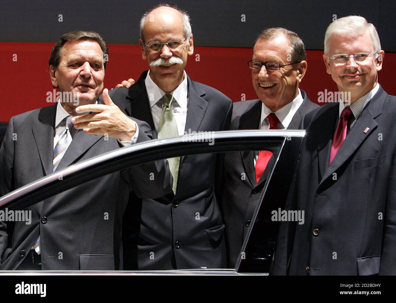 German chancellor Gerhard Schroeder talks to Mercedes CEO Zetsche at the  International car show IAA in Frankfurt. German chancellor Gerhard  Schroeder (L), talks to Dieter Zetsche (2L), Mercedes brand chairman and  designated