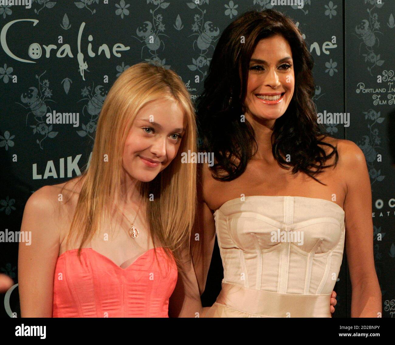 Actresses Dakota Fanning (L) and Teri Hatcher arrive at the premiere of the  animated movie "Coraline" in Portland, Oregon February 5, 2009. Fanning is  the voice of the main character Coraline. Hatcher