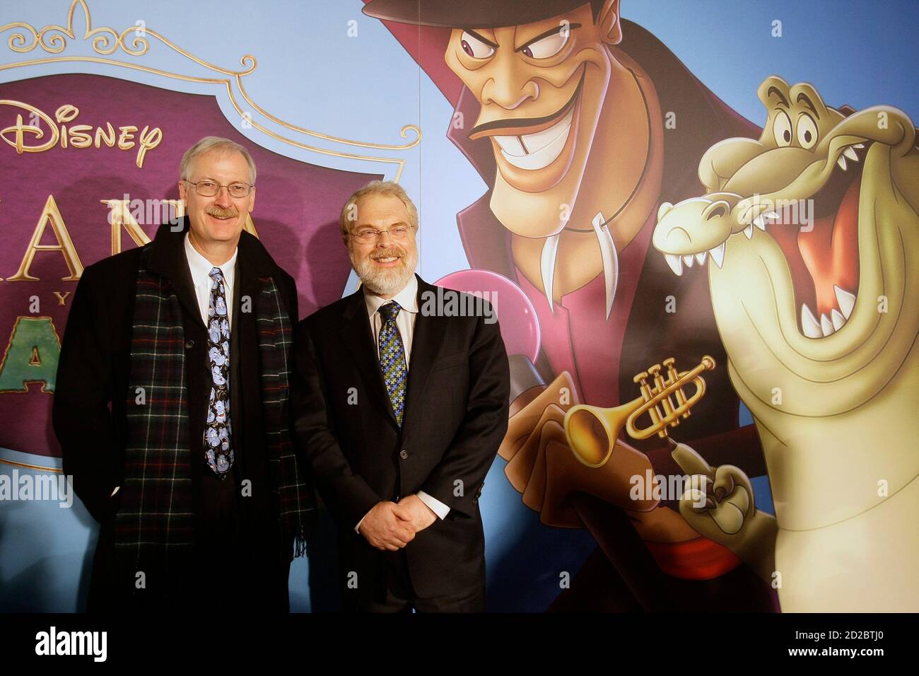 Directors John Musker (L) and Ron Clements pose during the Spanish premiere of  'The Princess and the Frog' in Madrid, January 29, 2010. REUTERS/Andrea Comas (SPAIN - Tags: ENTERTAINMENT) Stock Photo