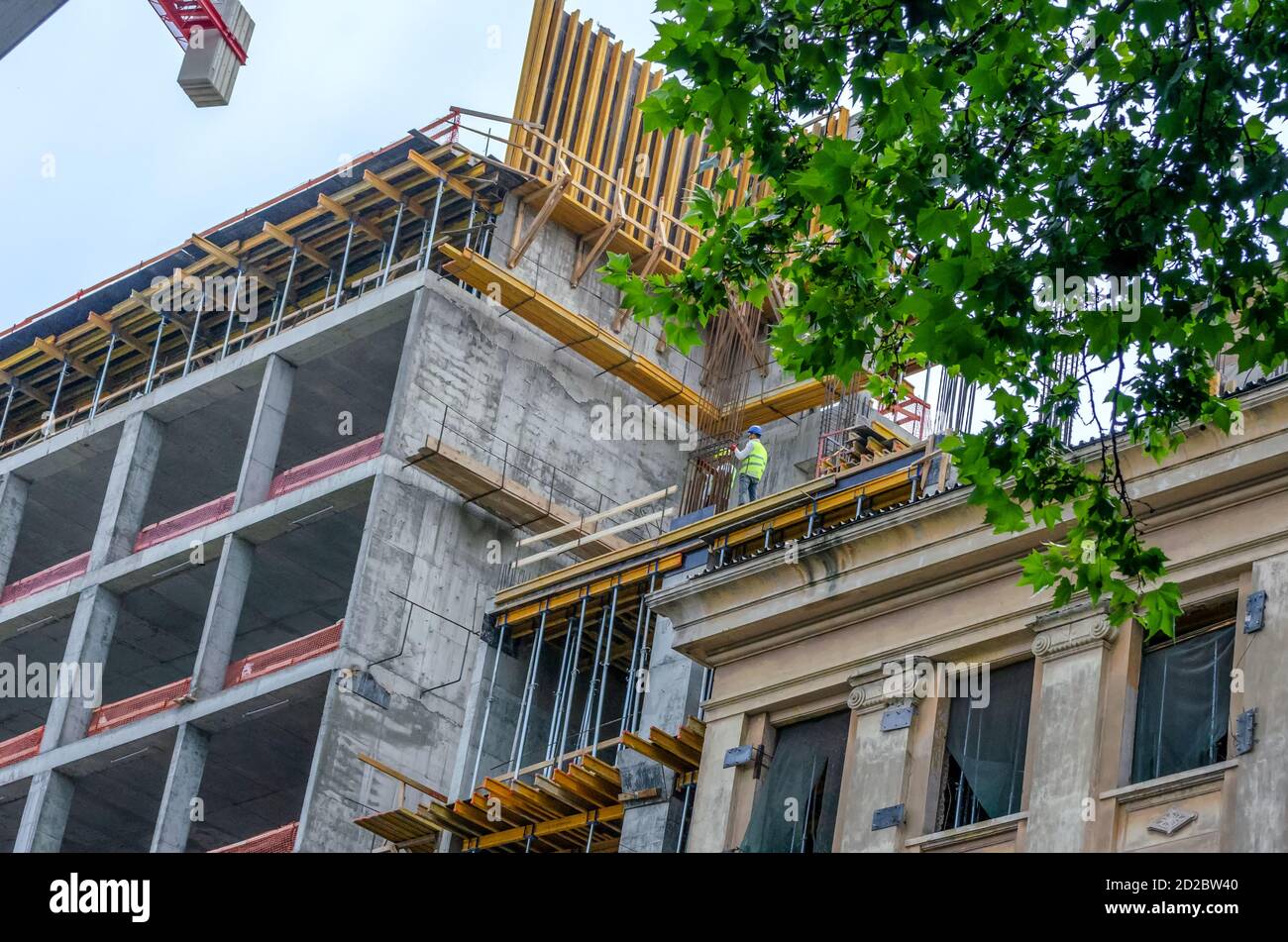 Tbilisi, June 28 2019 Builders install piles on the house