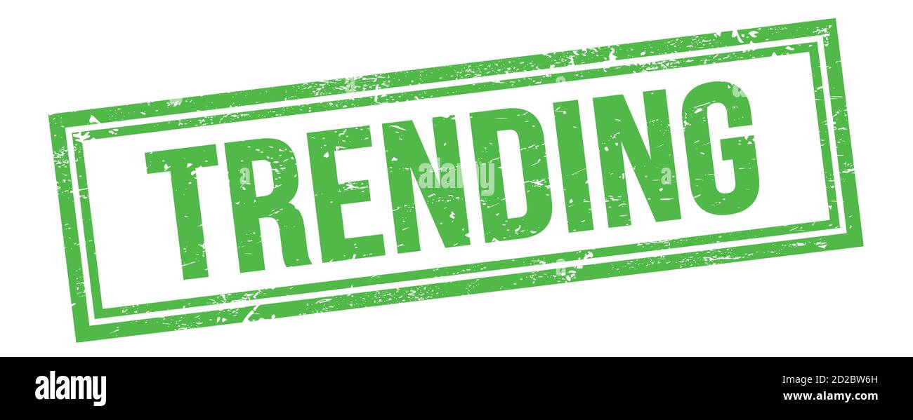 TRENDING text on green grungy vintage rectangle stamp Stock Photo - Alamy