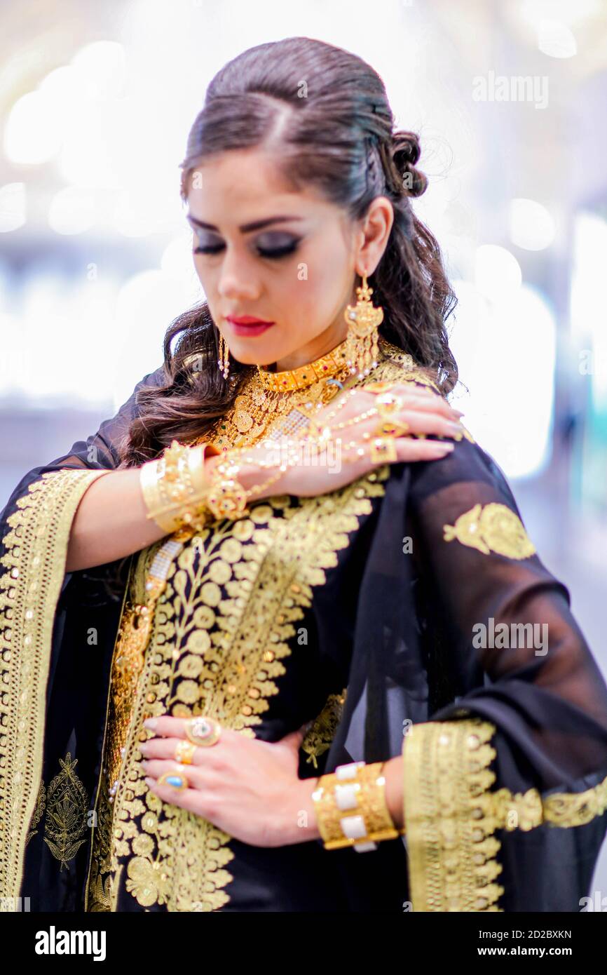 Arab Female in traditional dress with traditional jewelry Stock Photo ...