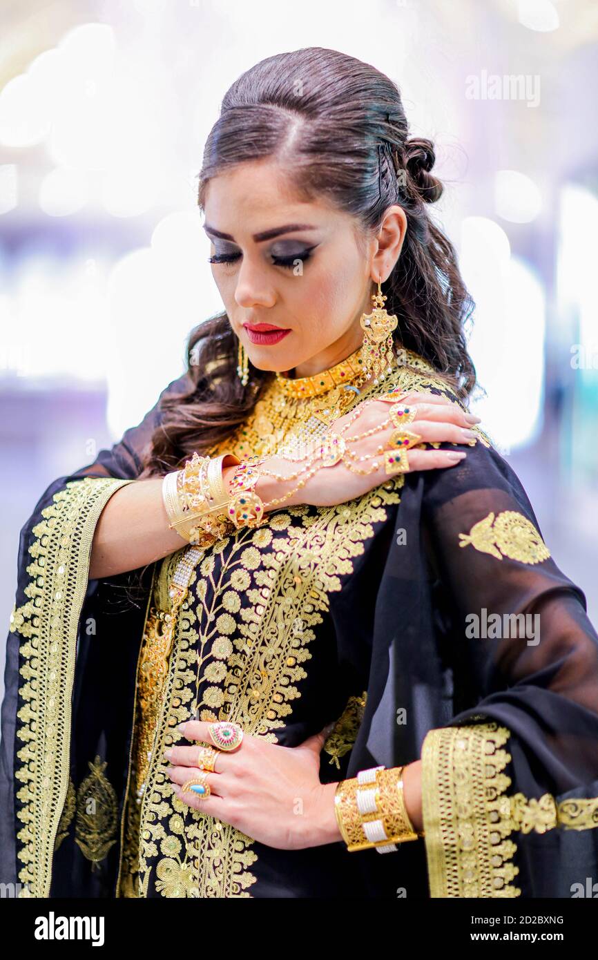 Arab Female in traditional dress with traditional jewelry Stock Photo ...