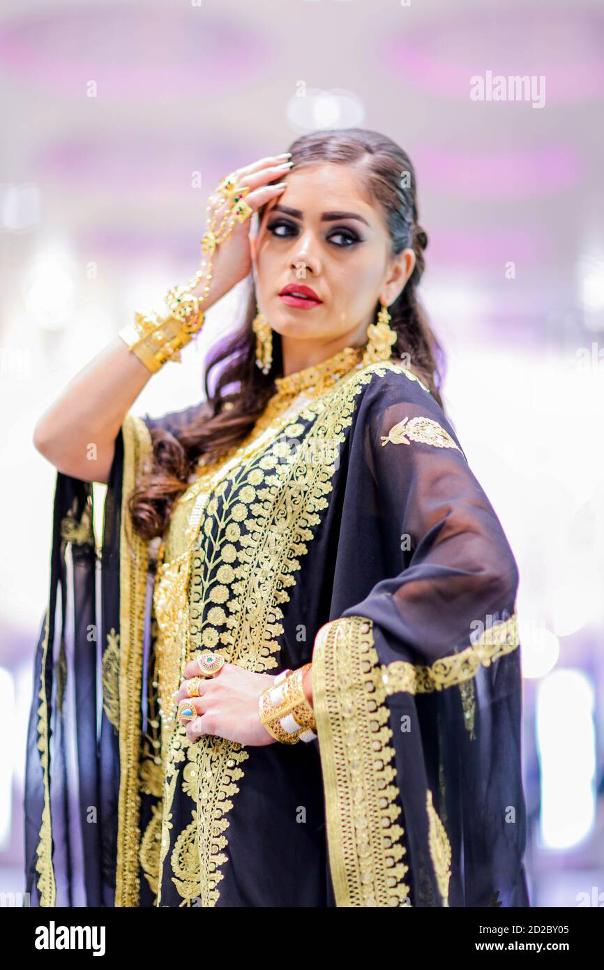 Arab Female in traditional dress with traditional jewelry Stock Photo ...