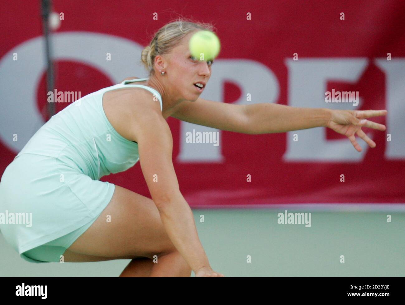 Julia Schruff of Germany returns the ball to Ai Sugiyama of Japan at