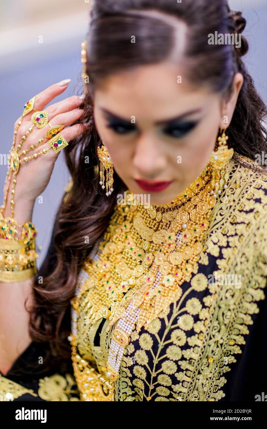 Arab Female in traditional dress with traditional jewelry Stock Photo ...