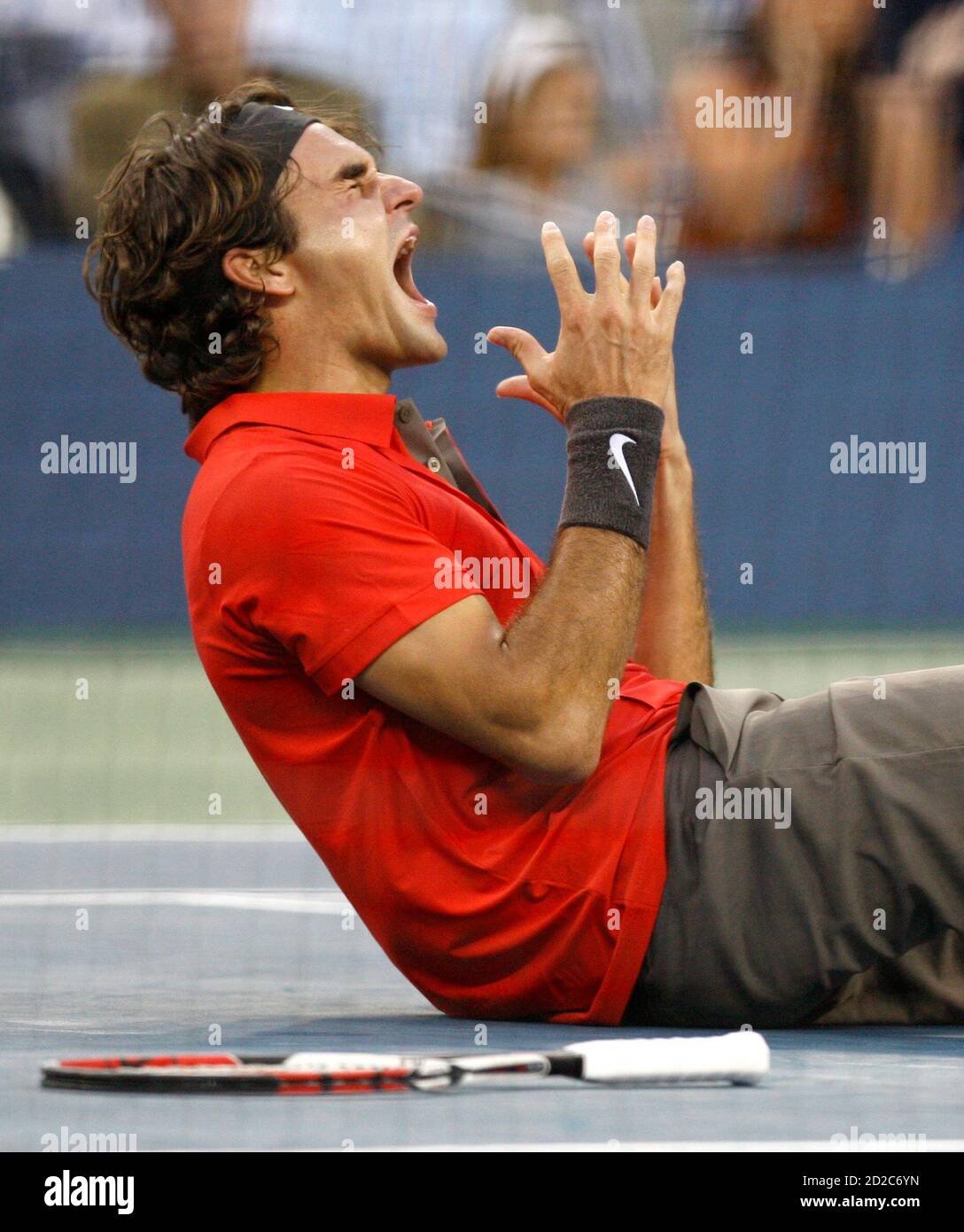 Roger Federer of Switzerland celebrates match point beating Andy Murray of  Britain for his fifth straight U.S. Open title during the men's final match  at the U.S. Open tennis tournament at Flushing