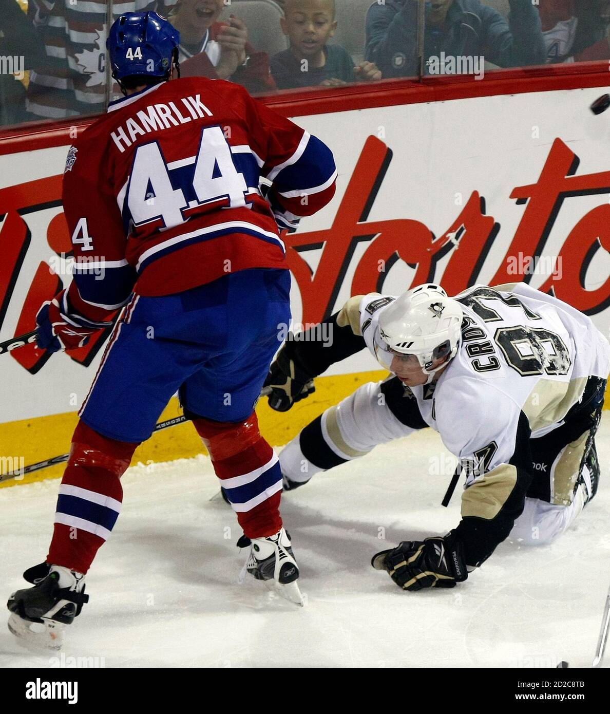 Pittsburgh Penguins Sidney Crosby 87 Is Checked By Montreal Canadiens Roman Hamrlik 44 During Second Period Nhl Hockey Action In Montreal April 11 2009 Reuters Christinne Muschi Canada Sport Ice Hockey Stock Photo Alamy