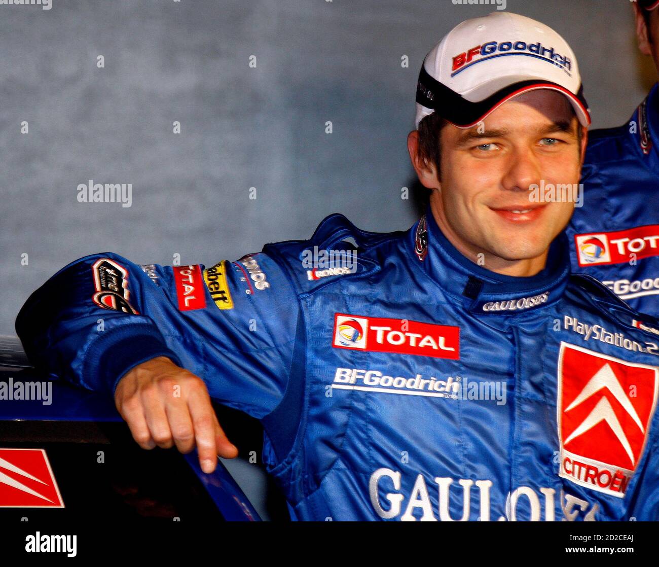 2005 rally world champion Sebastien Loeb of France poses during the  official showing of his Citroen Xsara WRC in Monte Carlo January 18, 2006.  Loeb will take part in the Monte Carlo