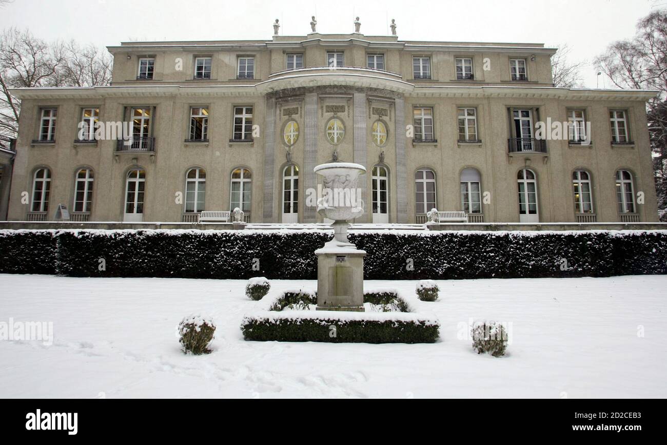 A general view shows the villa called 'The House of the Wannsee Conference' in Berlin's lakeside Wannsee district in this picture taken January 19, 2006. [On January 20, 1942, a group of 15 high-ranking Nazis chaired by Reinhard Heydrich, the Reichsprotektor of Bohemia and Moravia, met in the dining room of the villa where they ate breakfast, drank Cognac and discussed the bureaucratic details of killing Europe's Jews. The villa where the meeting took place is now a museum.] On Friday it reopens with a new permanent exhibition that offers a broad view of the 'Wannsee Conference' and how the Ho Stock Photo