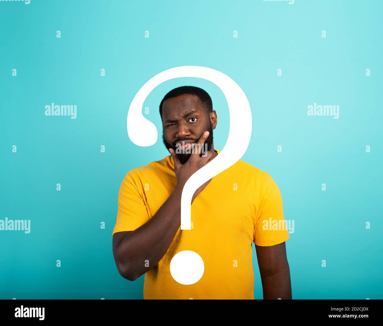 Confused Man has a big question to ask. Concept of options, confusion, decision. Stock Photo