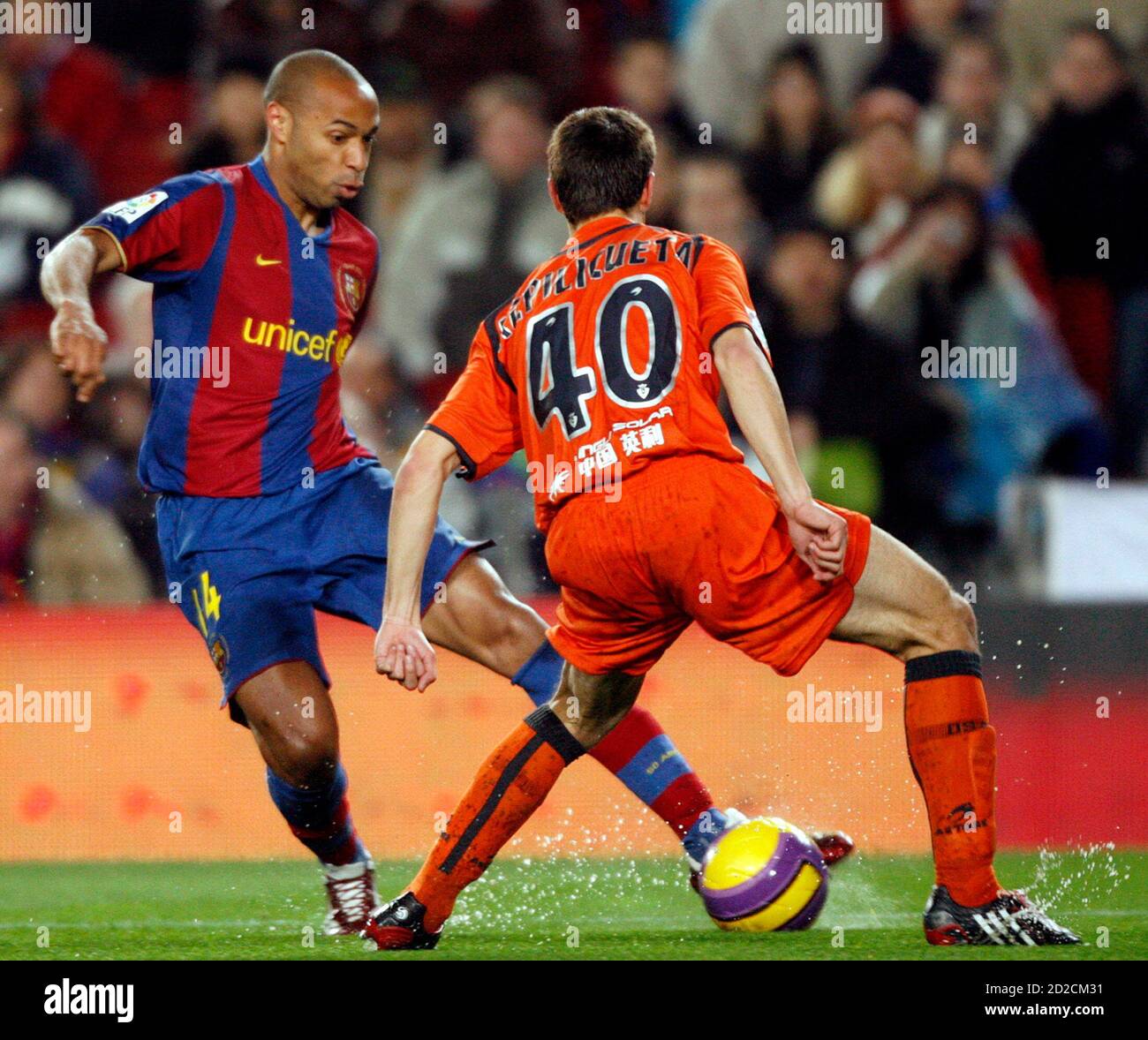 Osasuna S Cesar Azpilicueta R Challenges Barcelona S Thierry Henry For The Ball During Their Spanish First Division Soccer League Match At Nou Camp Stadium In Barcelona February 3 2008 Reuters Albert Gea Spain Stock