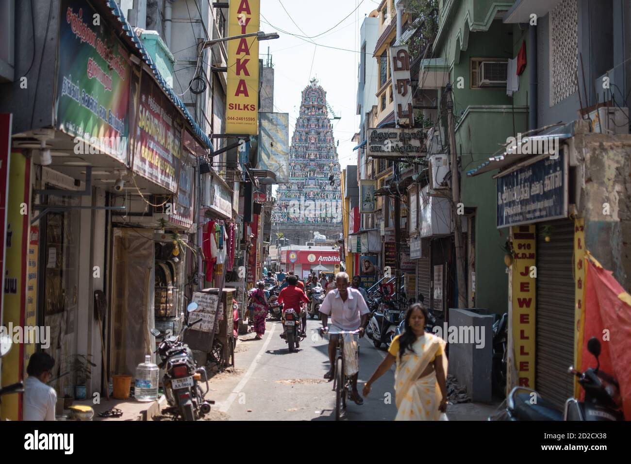 Chennai, India - February 8, 2020: View of Kapaleeshwarar Temple from an alley with unidentified people in traffic on February 2020 in Chennai, India Stock Photo