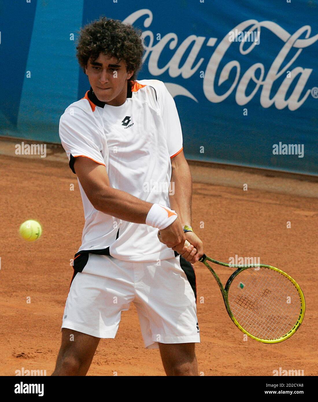 Argentina's Facundo Arguello hits a return to compatriot Agustin Velotti in  their Tennis final match at the South American Games in Medellin March 28,  2010. REUTERS/Albeiro Lopera (COLOMBIA - Tags: SPORT TENNIS
