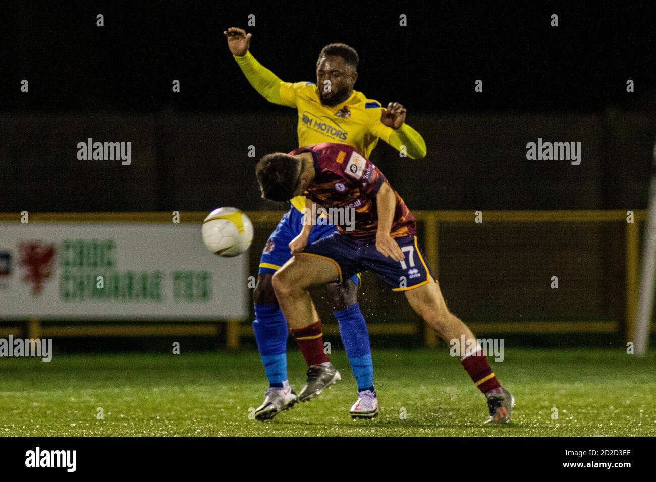 Barry, Wales, UK. 6th Oct, 2020. Jac Davies of Cardiff Met wins a header in  front of Kayne McLaggon of Barry Town Barry Town United v Cardiff Met at  Jenner Park in