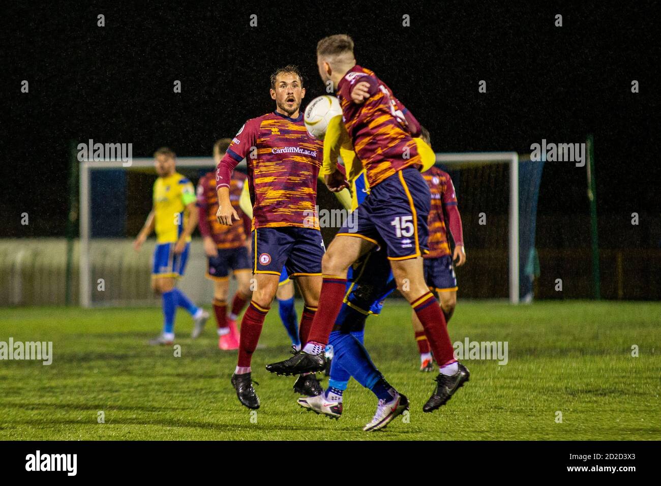 Barry, Wales, UK. 6th Oct, 2020. Joseph Evans of Cardiff Met wins a header  over Kayne McLaggon of Barry Town Barry Town United v Cardiff Met at Jenner  Park in the JD