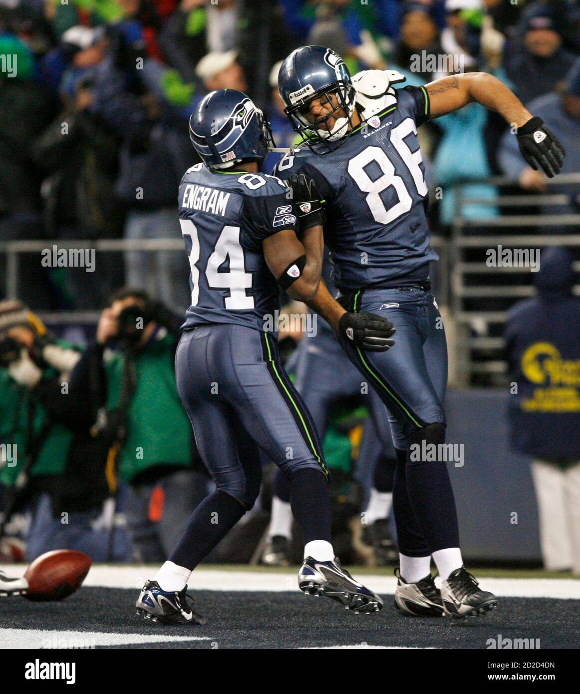 Seattle Seahawks' Jerramy Stevens (R) Celebrates A Fourth Quarter Touchdown With Teammate Bobby Engram (84) During Their Nfc Wild Card Nfl Playoff Football Game Against The Dallas Cowboys In Seattle January 6,