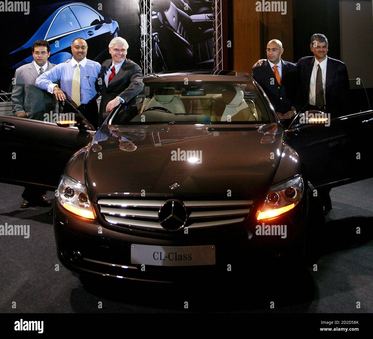 Managing Director And Chief Executive Of Daimlerchrysler India Wilfried Aulbur 3rd L And Other Officials Pose With The Mercedes Cl Class 500 Car During Its Launch In New Delhi April 6 07 Daimlerchrysler Managing Director And Chief Executive Of Daimlerchrysler India Wilfried Aulbur 3rd L And Other Officials Pose With The Mercedes Cl Class 500 Car During Its Launch In New Delhi April 6 07 Daimlerchrysler