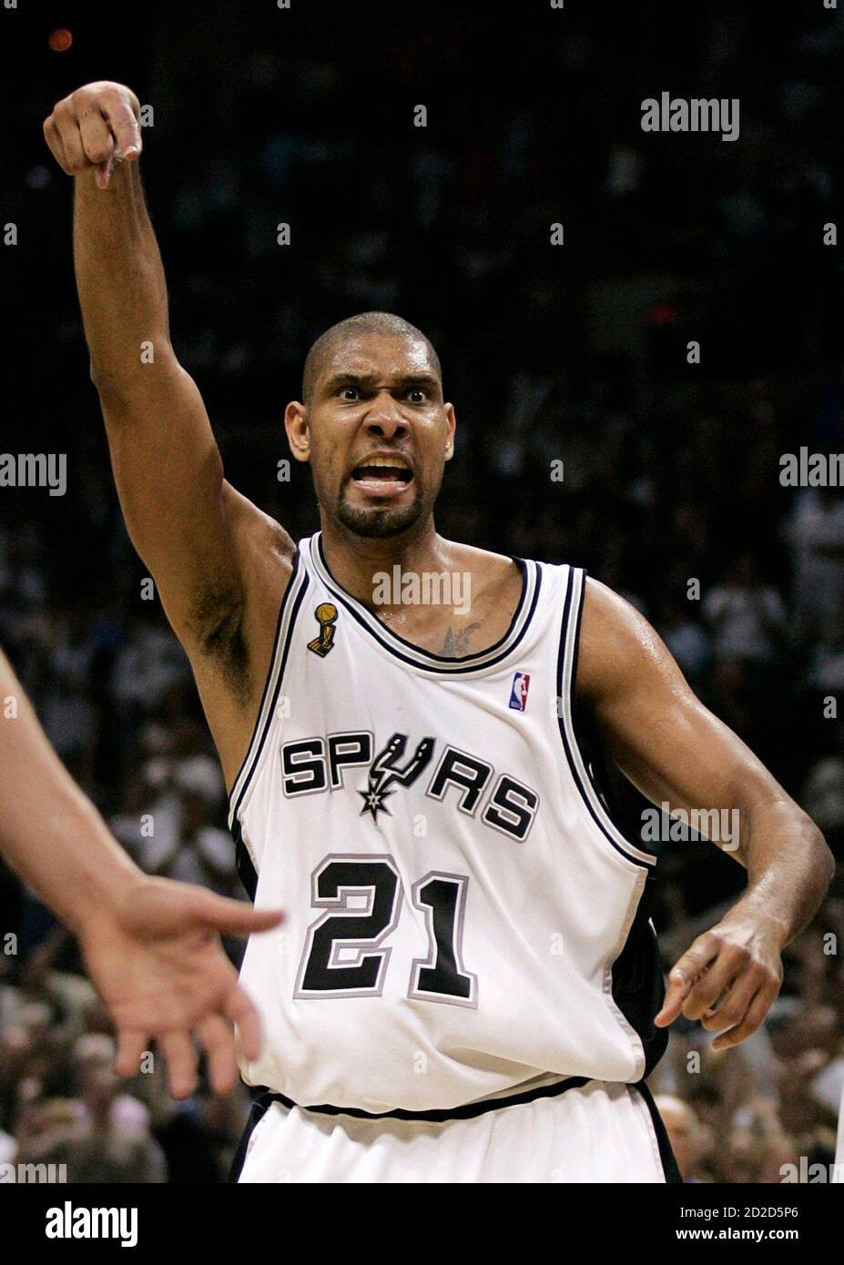 San Antonio Spurs' Tim Duncan reacts after scoring a basket against the  Cleveland Cavaliers during the 4th quarter of Game 2 of the NBA Finals  basketball series in San Antonio, Texas June