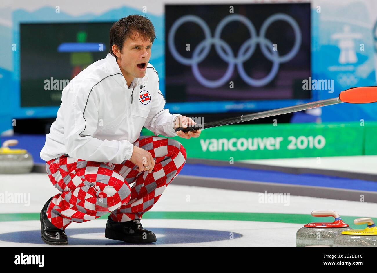 Norway's skip Thomas Ulsrud (L) shouts next to Denmark's skip Rasmus Stjerne during men's final match at the European Curling Championships in Champery December 11, 2010. Balibouse (SWITZERLAND