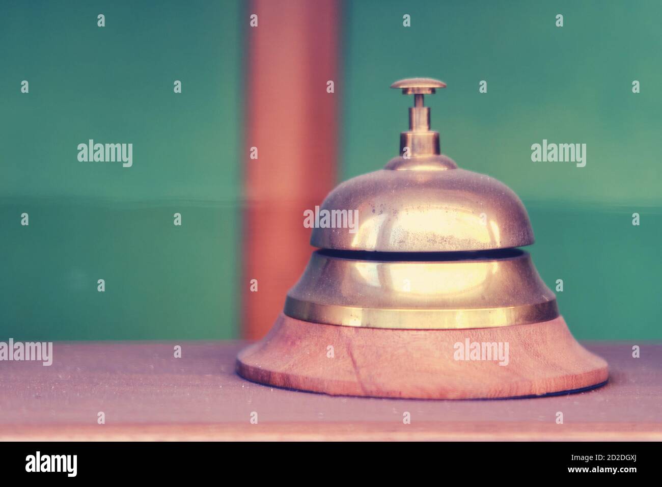Vintage table bell made of yellow metal, close up Stock Photo - Alamy