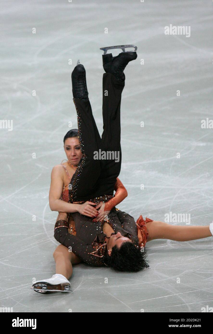 Italy's Federica Faiella and Massimo Scali fall as they perform during the  pairs Free Dance Programme of the European Figure Skating Championships at  the Torwar ice rink in Warsaw January 26, 2007.