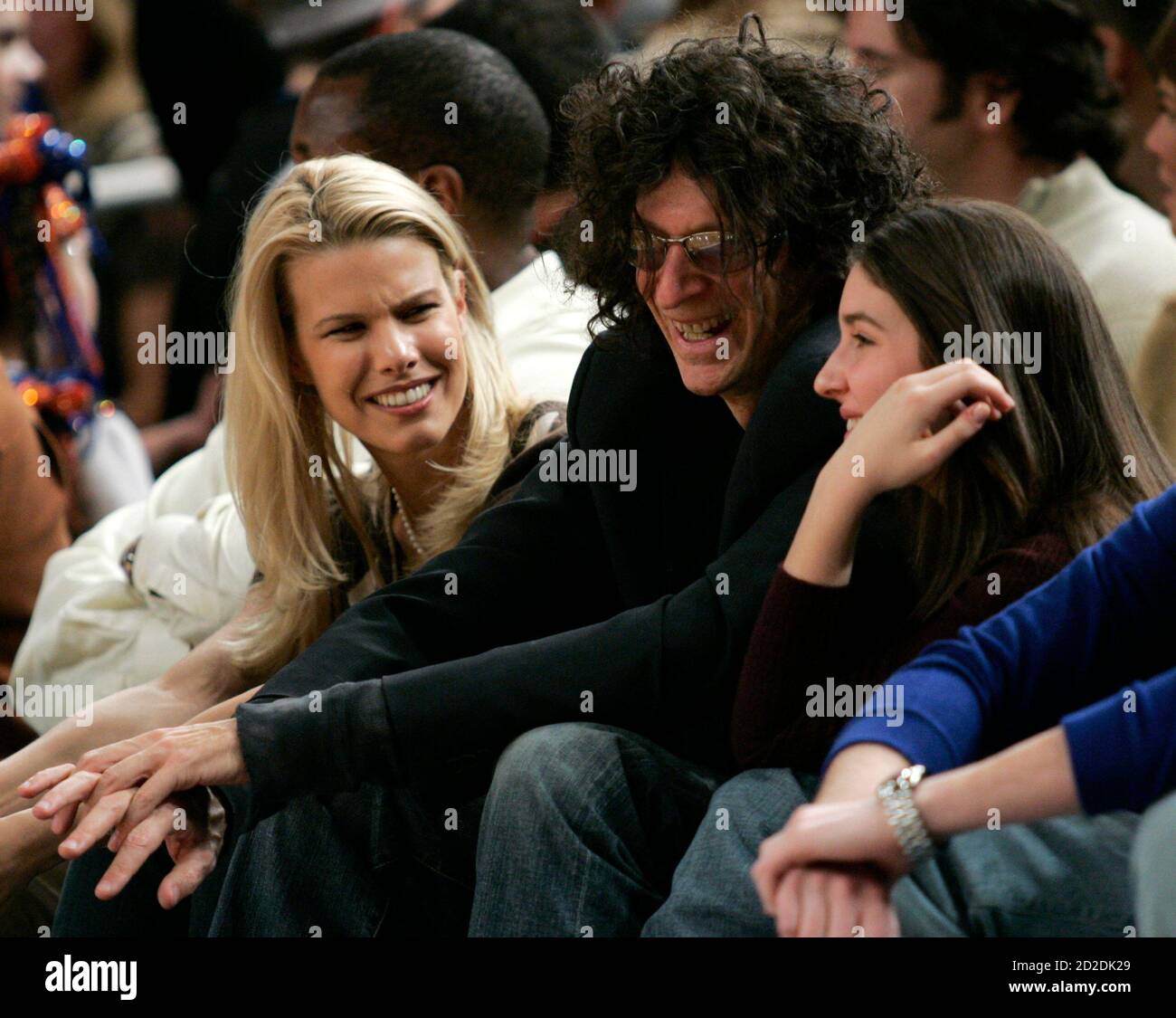 Radio Personality Howard Stern Watches The New York Knicks Play The Miami Heat With His Girlfriend Beth Ostrosky L And His Daughter Ashley Jade Stern During A Nba Basketball Game At Madison