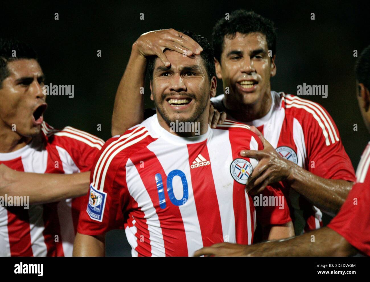 Paraguay S Salvador Cabanas C Celebrates With Teammates Osvaldo Martinez L And Carlos Bonet After Scoring A