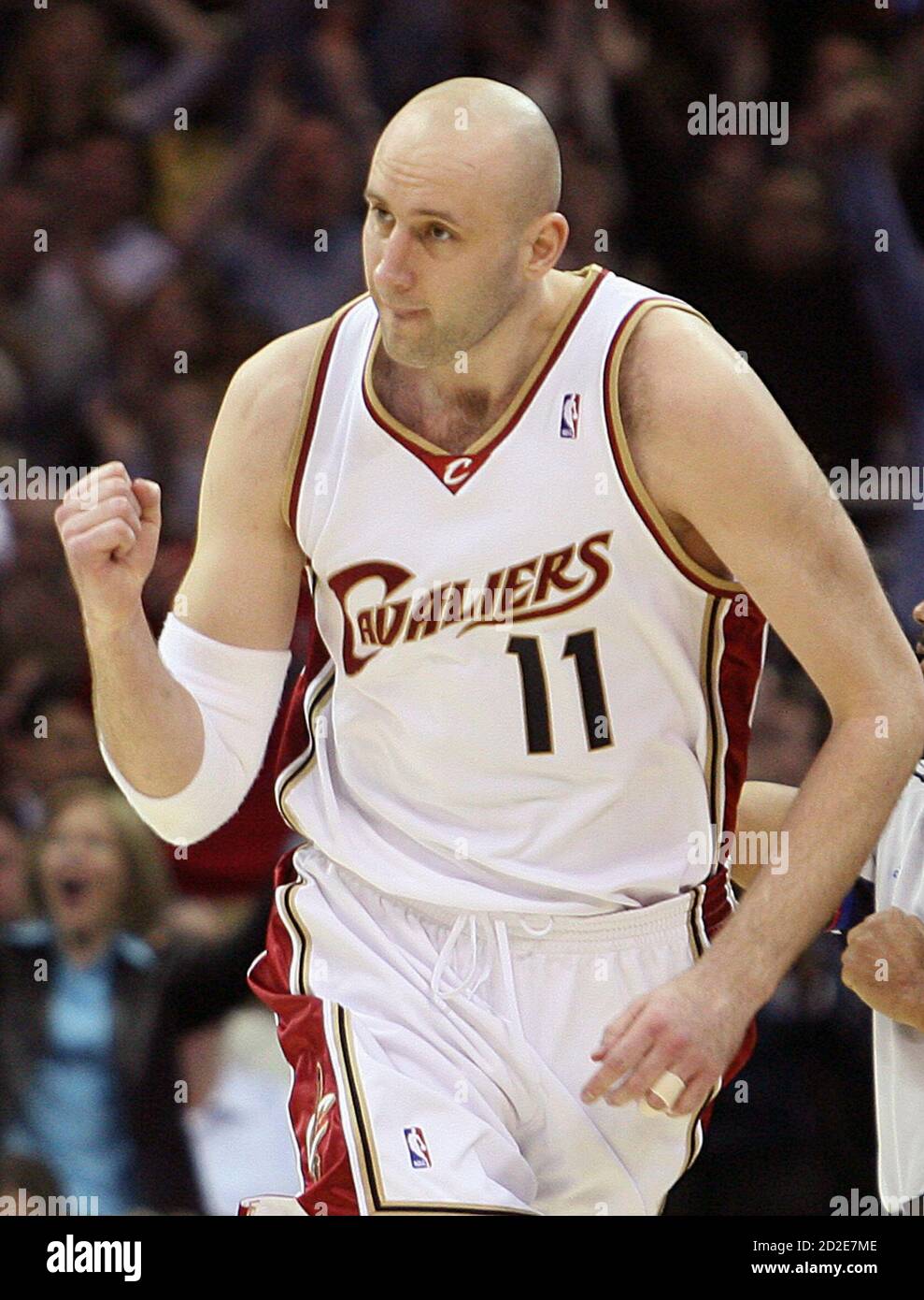 Cleveland Cavaliers' Zydrunas Ilgauskas pumps his fist after hitting a  three point shot in the fourth quarter of their NBA basketball game against  the Detroit Pistons in Cleveland March 19, 2008. REUTERS/Aaron