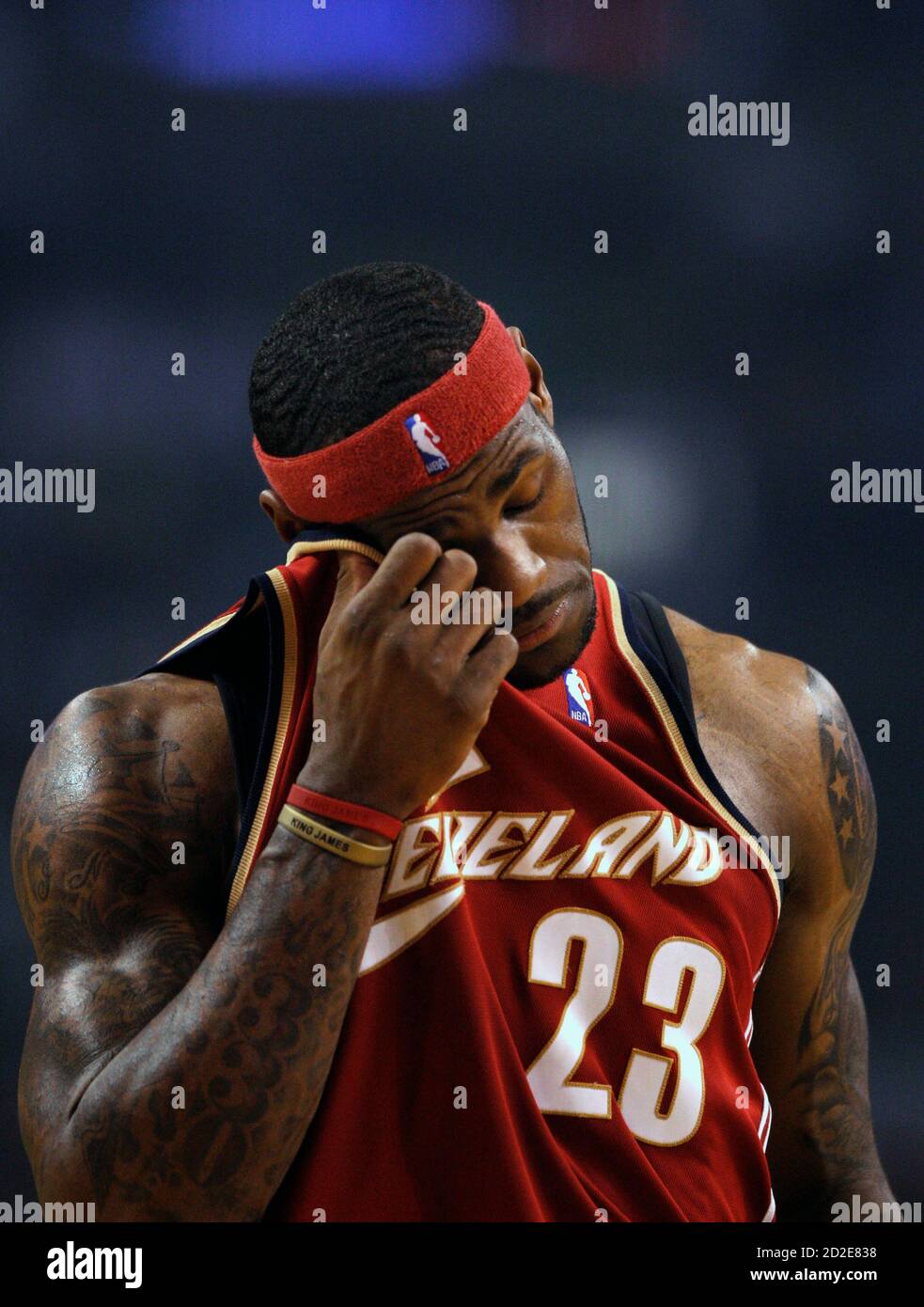 Cleveland Cavaliers LeBron James wipes his head in a break in play against  the Boston Celtics during the first half of Game 1 in their NBA Eastern  Conference semi-final basketball playoff series