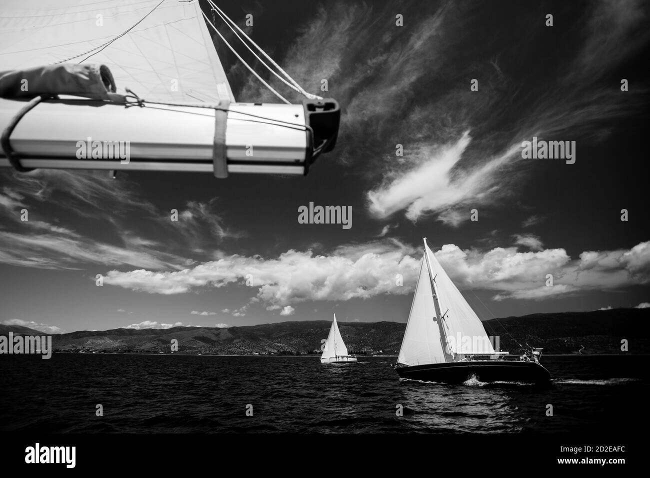 Boats in the regatta in the Aegean Sea. Luxury sailing. Black and white photo. Stock Photo