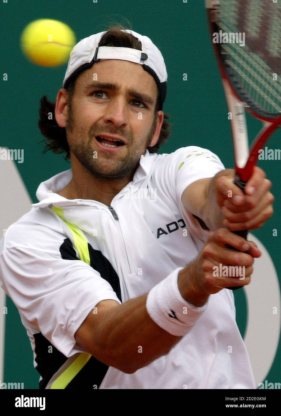Nicolas Kiefer of Germany hits a returns during his Monte Carlo tennis open  match against Max Mirnyi of Belarus in Monaco April 17, 2006.  REUTERS/Pascal Deschamps Stock Photo - Alamy
